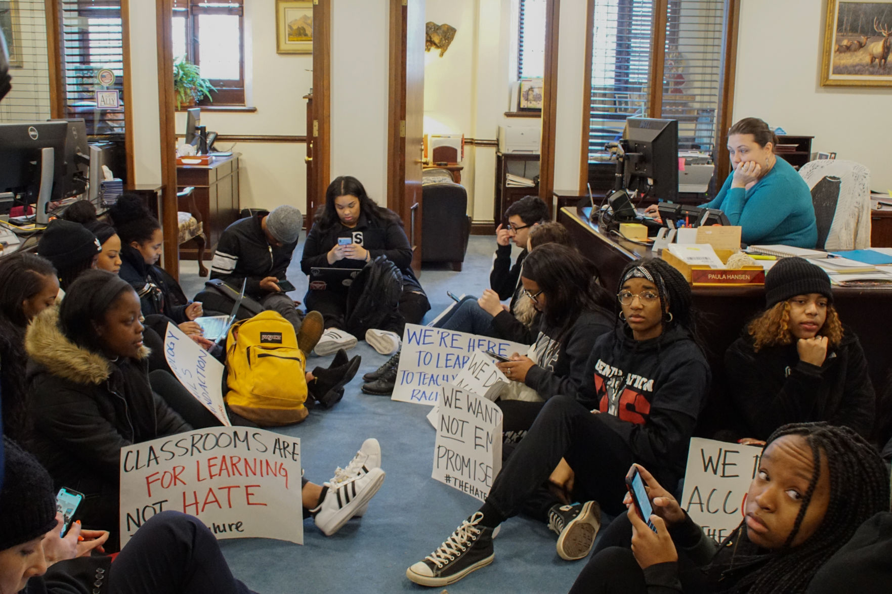 Sit-in sign